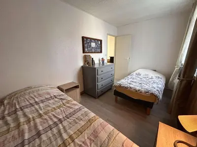 Un ou plusieurs lits dans un hébergement de l'établissement Superbe Appartement 3 pièces, 6 Couchages, Plage à 50m - FR-1-224C-365