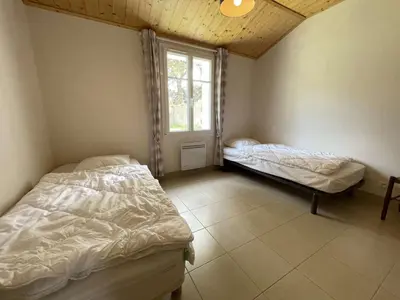 Un ou plusieurs lits dans un hébergement de l'établissement NO000-047 Mais 4 pièces- 5 couchages NOIRMOUTIER EN L'ILE