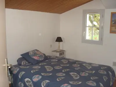 Un ou plusieurs lits dans un hébergement de l'établissement NO000-05D Mais 4 pièces - 6 couchages NOIRMOUTIER