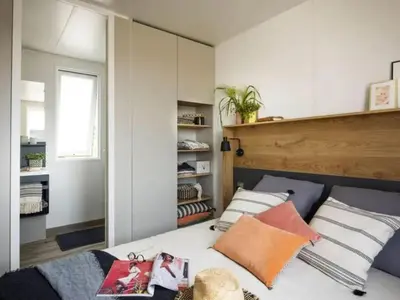 Un ou plusieurs lits dans un hébergement de l'établissement Confortable Mobil-home 36m² avec Terrasse à Saint-Jean-de-Monts - API-1-52-1463