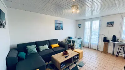 Coin salon dans l'établissement Appartement de l'Océan, calme et proximité