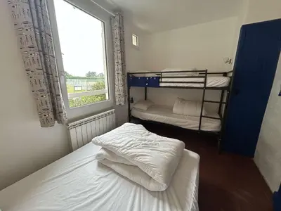 Un ou plusieurs lits dans un hébergement de l'établissement GU010-066 Maison 4 pièces- LA GUERINIERE- LES SABLES D'OR