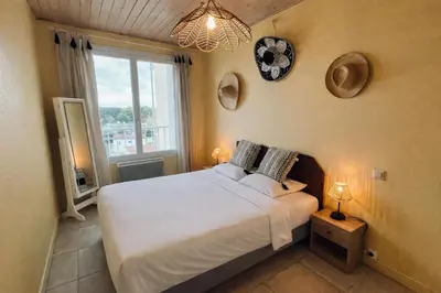 Un ou plusieurs lits dans un hébergement de l'établissement Océan immersif, appartement du front de mer