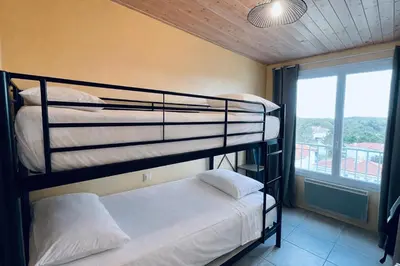 Un ou plusieurs lits dans un hébergement de l'établissement Océan immersif, appartement du front de mer