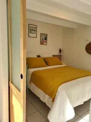 Un ou plusieurs lits dans un hébergement de l'établissement Le Citrus - Séjour cosy en plein centre historique