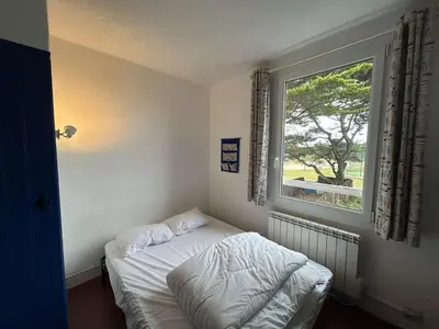 Un ou plusieurs lits dans un hébergement de l'établissement Maison familiale lumineuse, près de la plage, parking inclus - FR-1-224B-251