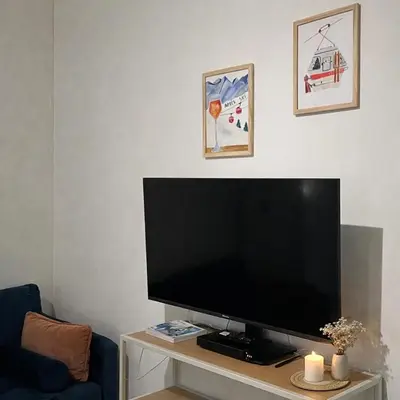 Télévision ou salle de divertissement dans l'établissement Instant Angers Hyper Centre
