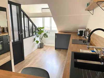 Cuisine ou kitchenette dans l'établissement Bel appartement de charme, calme au centre ville MH