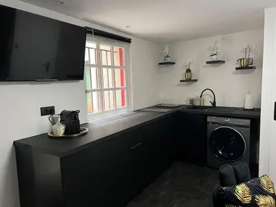 Cuisine ou kitchenette dans l'établissement Le Lux Nantes Centre