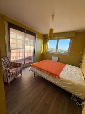 Un ou plusieurs lits dans un hébergement de l'établissement Bel appartement front de mer