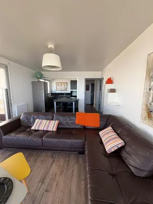 Coin salon dans l'établissement Bel appartement front de mer
