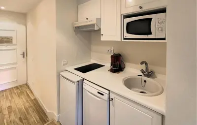 Cuisine ou kitchenette dans l'établissement Cocon Près De La Baule