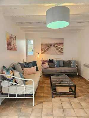Coin salon dans l'établissement Villa 11 pers 4CH - Jacuzzi - Le Cormier