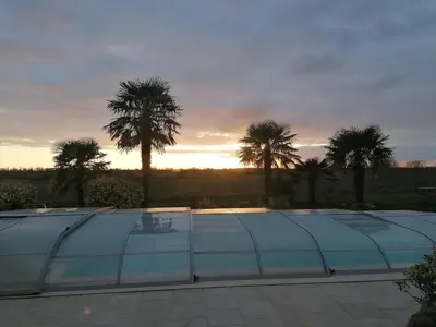 Lever ou coucher de soleil vu de la maison de vacances ou à proximité