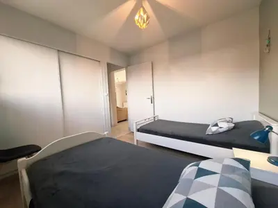 Un ou plusieurs lits dans un hébergement de l'établissement Maison rénovée à 300 m de la plage