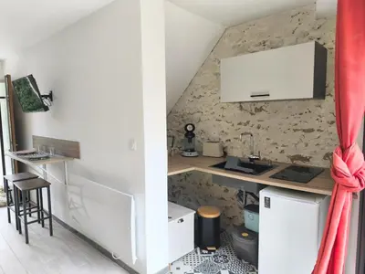 Cuisine ou kitchenette dans l'établissement Le Nautile - petit déjeuner - 10mn du Parc