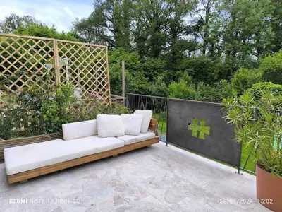 Jardin de l'établissement La Dilettante - petit déjeuner inclus - 10mn du Parc