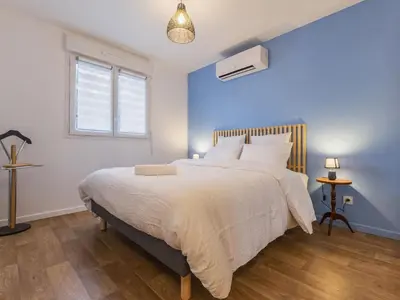 Un ou plusieurs lits dans un hébergement de l'établissement Maison calme proche plages St Nazaire avec WiFi et parking - FR-1-306-1330