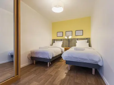Un ou plusieurs lits dans un hébergement de l'établissement Maison calme proche plages St Nazaire avec WiFi et parking - FR-1-306-1330