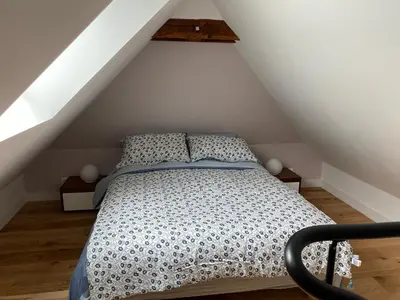 Un ou plusieurs lits dans un hébergement de l'établissement Pavillon du XIXème au milieu des vignes