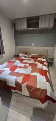 Un ou plusieurs lits dans un hébergement de l'établissement Mobil-Home Le Bois Dormant 87