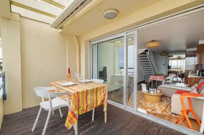 Coin salon dans l'établissement Le Carlina by TAH - Face mer-Balcon-Parking-WIFI