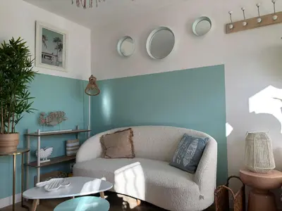 Coin salon dans l'établissement Le cosy beach