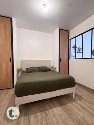 Un ou plusieurs lits dans un hébergement de l'établissement Tranquiloue - Appartement cosy 15min du Puy du Fou