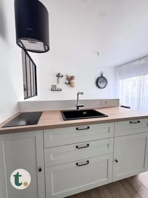 Cuisine ou kitchenette dans l'établissement Tranquiloue - Appartement cosy 15min du Puy du Fou