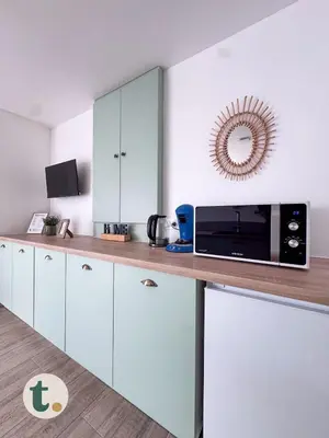 Cuisine ou kitchenette dans l'établissement Tranquiloue - Appartement cosy 15min du Puy du Fou