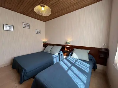 Un ou plusieurs lits dans un hébergement de l'établissement SJ000-00R - Maison 3 pièces 5 couchages - SAINT JEAN DE MONTS