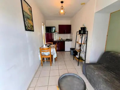 Cuisine ou kitchenette dans l'établissement L' Appartement