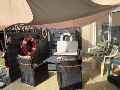Coin salon dans l'établissement Suite Familiale à Proximité de la Mer - FR-1-306-1331
