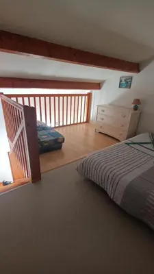 Un ou plusieurs lits dans un hébergement de l'établissement La maison du lac