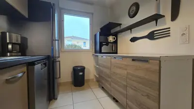 Cuisine ou kitchenette dans l'établissement Maison calme et lumineuse à proximité des plages de Pornic