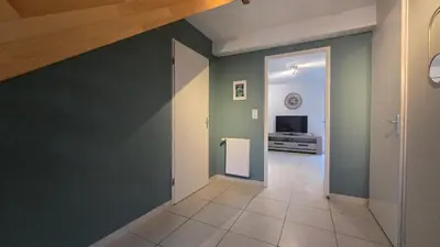 Télévision ou salle de divertissement dans l'établissement Maison calme et lumineuse à proximité des plages de Pornic