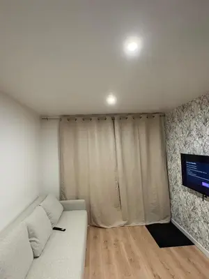 Télévision ou salle de divertissement dans l'établissement Logement neuf 4 personnes Proche centre-bourg
