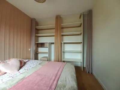 Un ou plusieurs lits dans un hébergement de l'établissement Cottage atypique en plein coeur des vignes