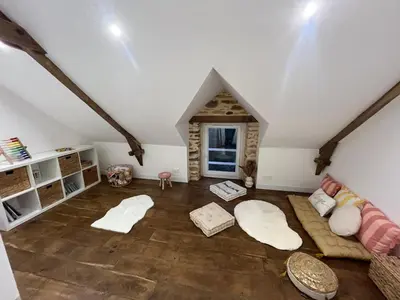 Un ou plusieurs lits dans un hébergement de l'établissement Gite le moulin du Roho
