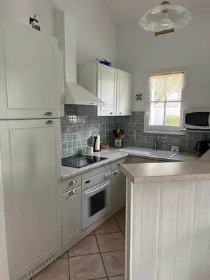 Cuisine ou kitchenette dans l'établissement Villa de Vertmarines
