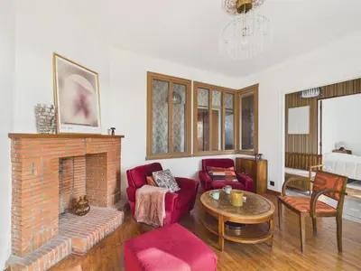 Coin salon dans l'établissement Maison tout confort pour 8 avec jardin