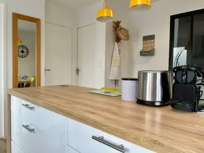 Cuisine ou kitchenette dans l'établissement T3 Graphic en bord de mer