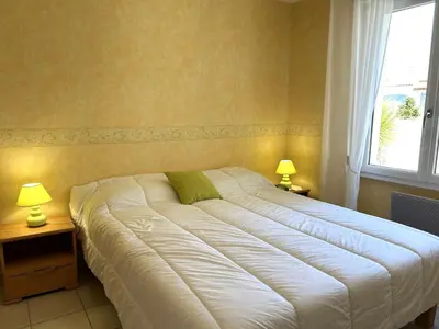 Un ou plusieurs lits dans un hébergement de l'établissement SG000-009 Maison 4 pièces 6 couchages LE FENOUILLER