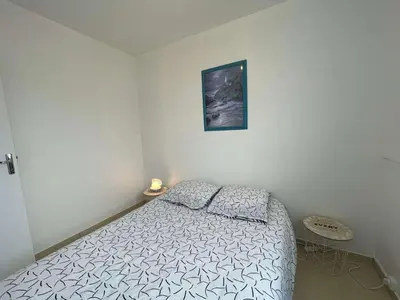 Un ou plusieurs lits dans un hébergement de l'établissement SH210-35C - Appart 3 pièces 6 couchages -SAINT HILAIRE DE RIEZ