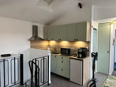 Cuisine ou kitchenette dans l'établissement Logis Nature au pied du Château