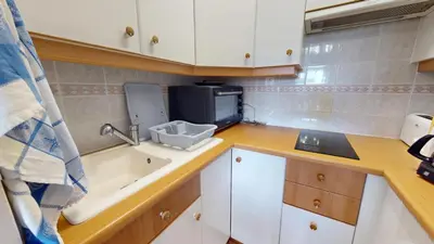 Cuisine ou kitchenette dans l'établissement Le Nautica