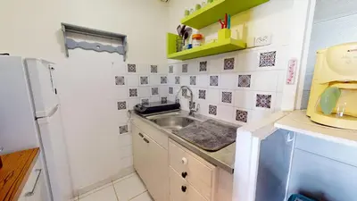 Cuisine ou kitchenette dans l'établissement Abri des Galees