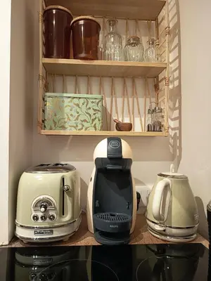 Cuisine ou kitchenette dans l'établissement La Maison du Port de Couëron - Appartement Romance