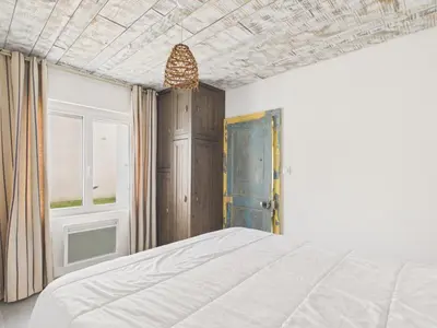Un ou plusieurs lits dans un hébergement de l'établissement 100 m de la plage, terrasse, maison pour 2