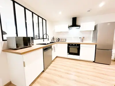 Cuisine ou kitchenette dans l'établissement Le Cocon Marin, à deux pas du centre et de la mer